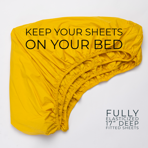 fully elasticized yellow organic cotton fitted sheet that will stay on your bed