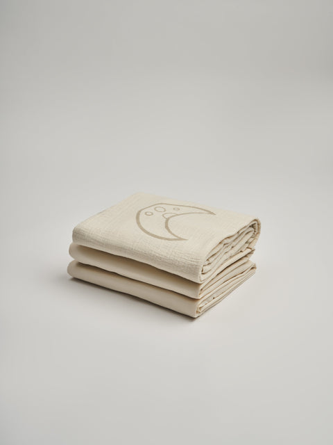 Organic and Fairtrade Cotton Crib Sheet and Muslin Wrap Set in Natural with Moons#color_natural-moons