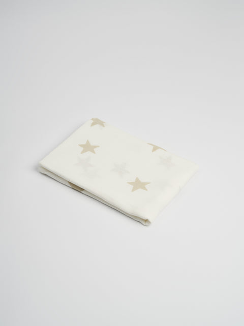 Organic and Fairtrade Cotton Crib Sheet and Muslin Wrap Set in White with Stars#color_white-stars