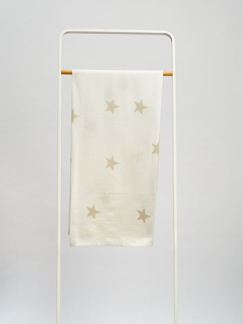 Organic and Fairtrade Cotton Muslin Swaddle in White with Stars#color_white-stars