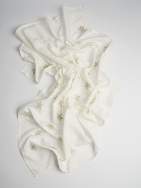 Organic and Fairtrade Cotton Muslin Swaddle in White with Stars#color_white-stars