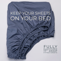 fully elasticized blue organic cotton fitted sheet that will stay on your bed