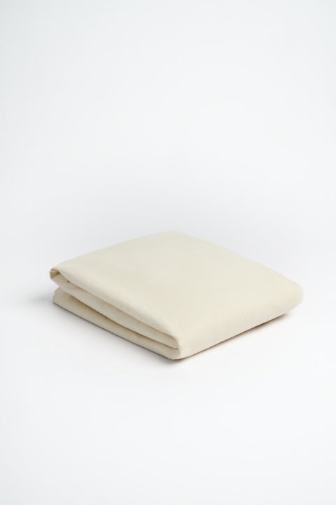 Organic and Fairtrade Warm + Cozy Flannel Fitted Sheet in Natural#color_natural-flannel