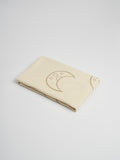 Organic and Fairtrade Cotton Muslin Swaddle in Natural with Moons#color_natural-moons