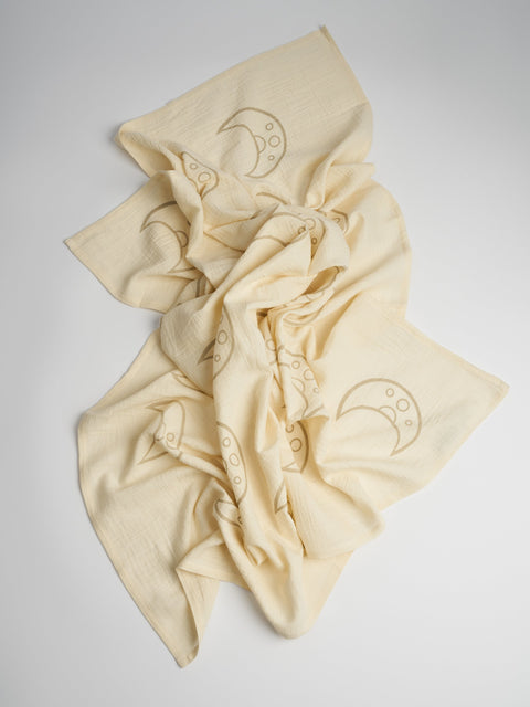 Organic and Fairtrade Cotton Crib Sheet and Muslin Wrap Set in Natural with Moons#color_natural-moons