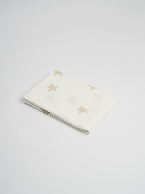 Organic and Fairtrade Cotton Muslin Swaddle in White with Stars#color_white-stars