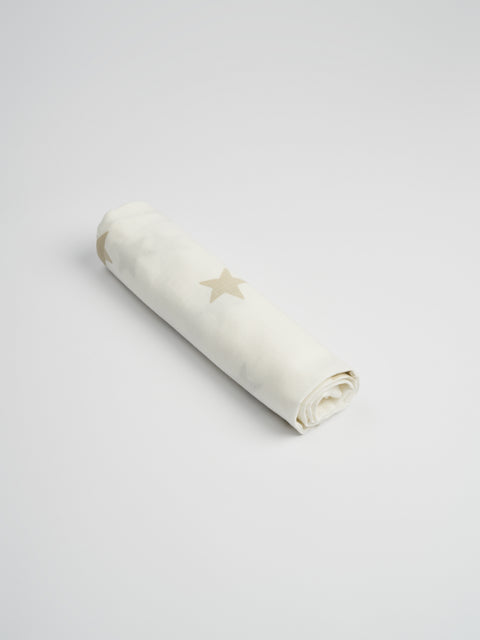 Organic and Fairtrade Cotton Muslin Swaddle in White with Stars#color_white-stars