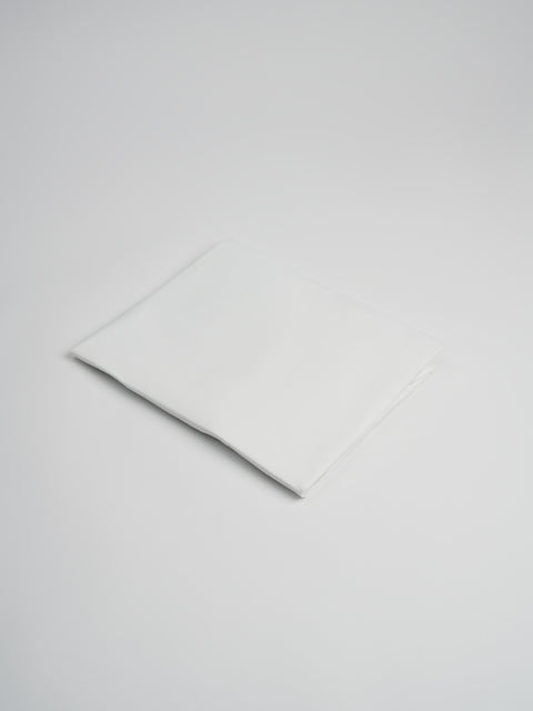 Organic and Fairtrade Cotton Crib Sheet in White#color_white