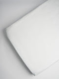 Organic and Fairtrade Cotton Crib Sheet in White#color_white