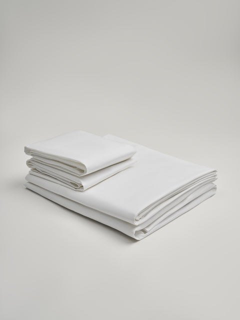 Organic and Fairtrade Warm + Luxurious Cotton Bed Sheet Set in White#color_white